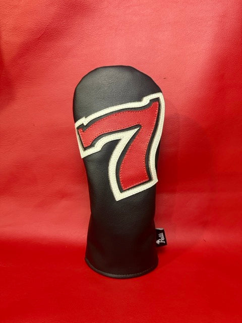 Black leather driver cover with a red and white lucky number 7 inlay